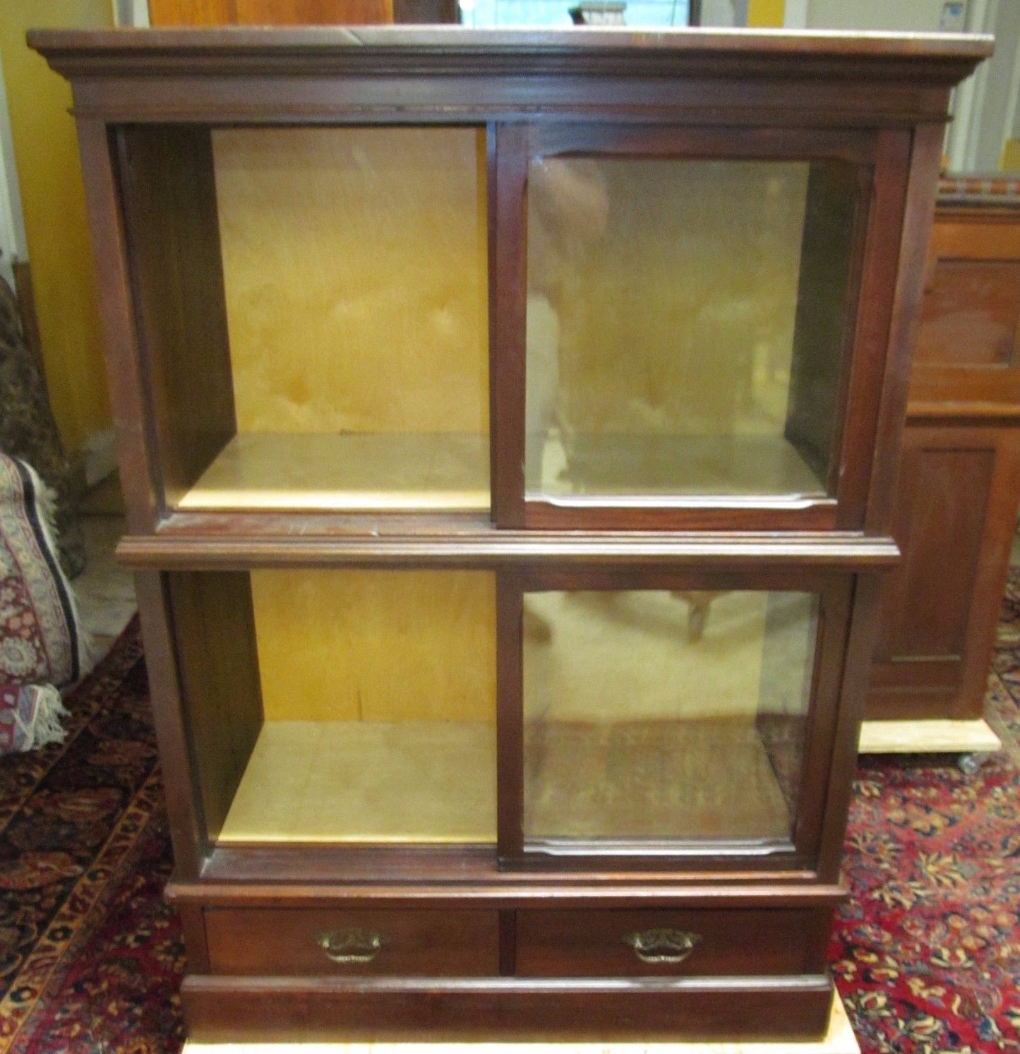 ANTIQUE RAISED PANELED BOOKCASE IN SOLID MAHOGANY-HOLDS ENCYCLOPEDIA SIZED BOOKS
