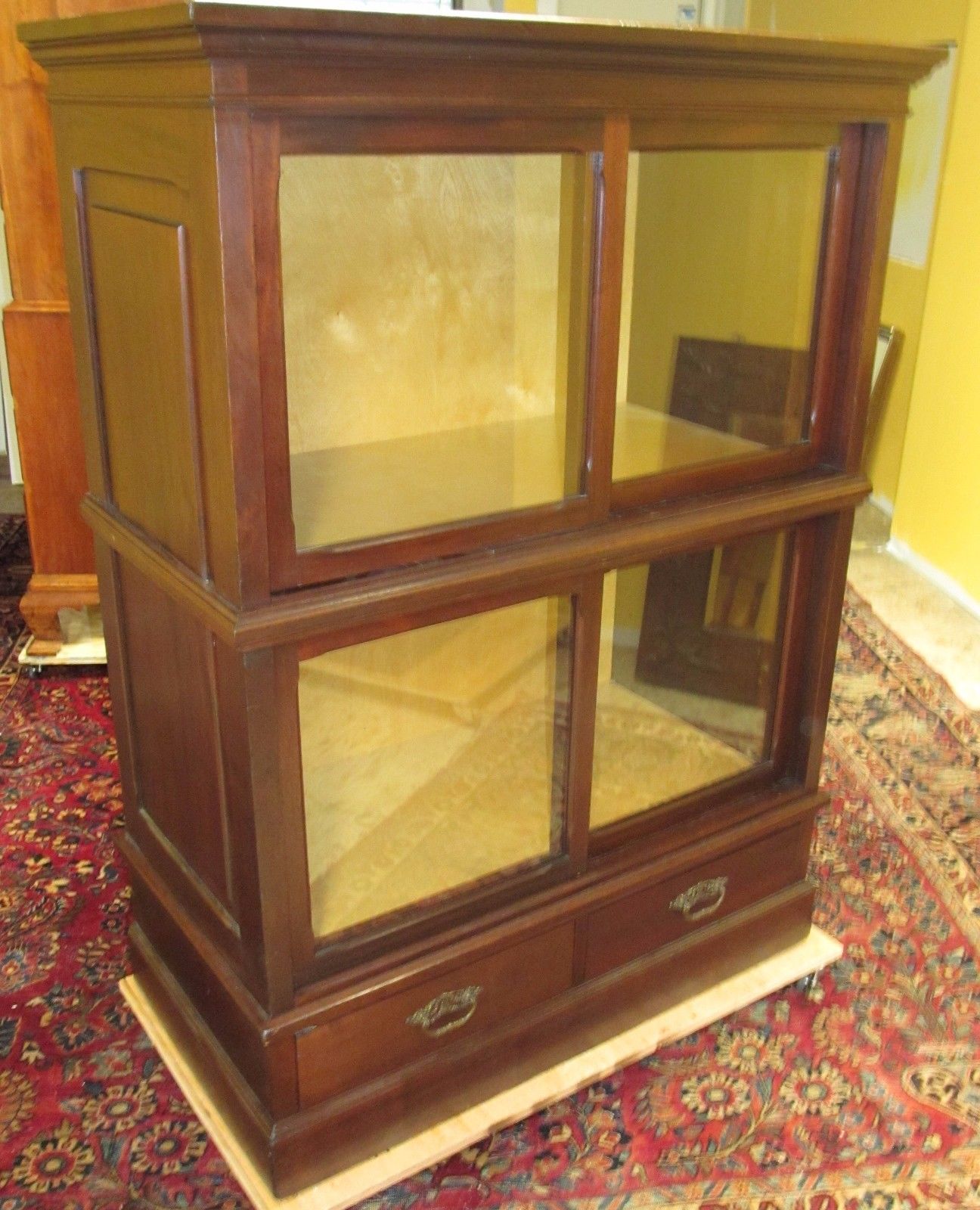 ANTIQUE RAISED PANELED BOOKCASE IN SOLID MAHOGANY-HOLDS ENCYCLOPEDIA SIZED BOOKS