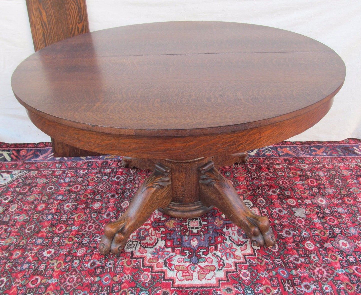 EXTRA CHOICE VICTORIAN TIGER OAK DINING TABLE WITH LION PAW BASE BY LARKIN
