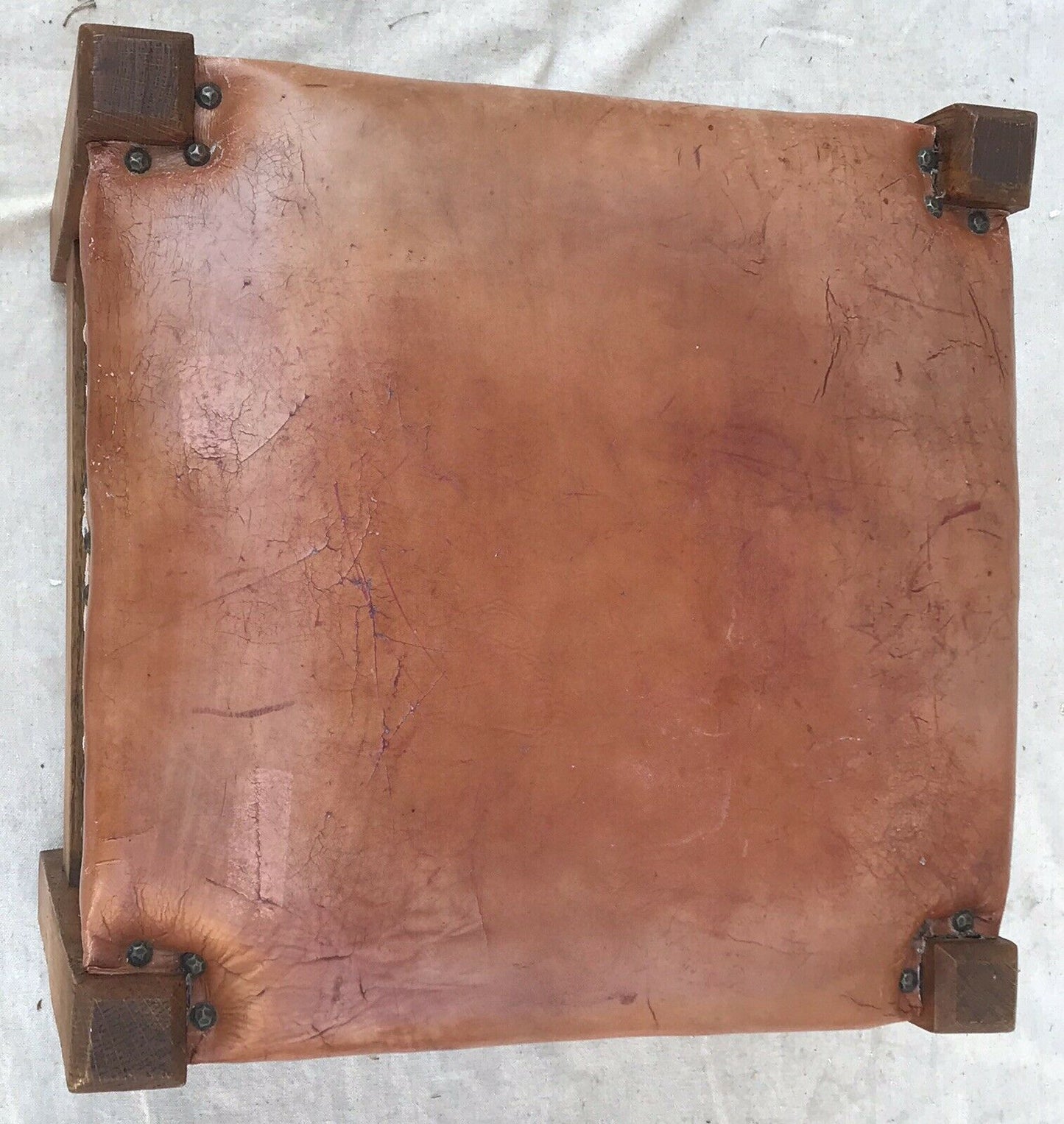 20TH C ARTS & CRAFTS / MISSION OAK STYLE BURNT ORANGE LEATHER TOP FOOTSTOOL