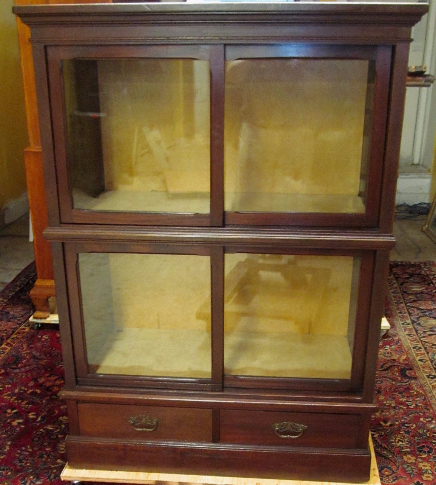 ANTIQUE RAISED PANELED BOOKCASE IN SOLID MAHOGANY-HOLDS ENCYCLOPEDIA SIZED BOOKS