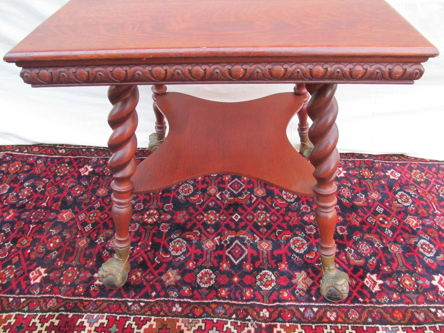 VICTORIAN TIGER OAK PARLOR TABLE WITH GLASS BALL & CAST IRON GROTESQUE HEAD FEET