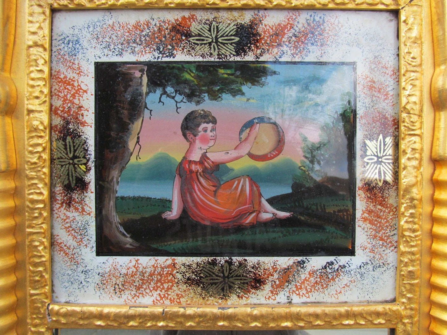SHERATON REVERSE GLASS PAINTED MIRROR DEPICTING "GIRL PLAYING TAMBOURINE"-LOOK
