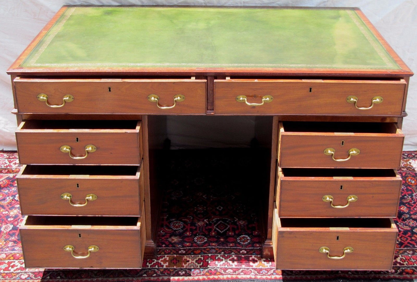 FINE GEORGIAN MAHOGANY CAMPAIGN DESK WITH LEATHER TOP AND PARTNER'S DESK FEATURE
