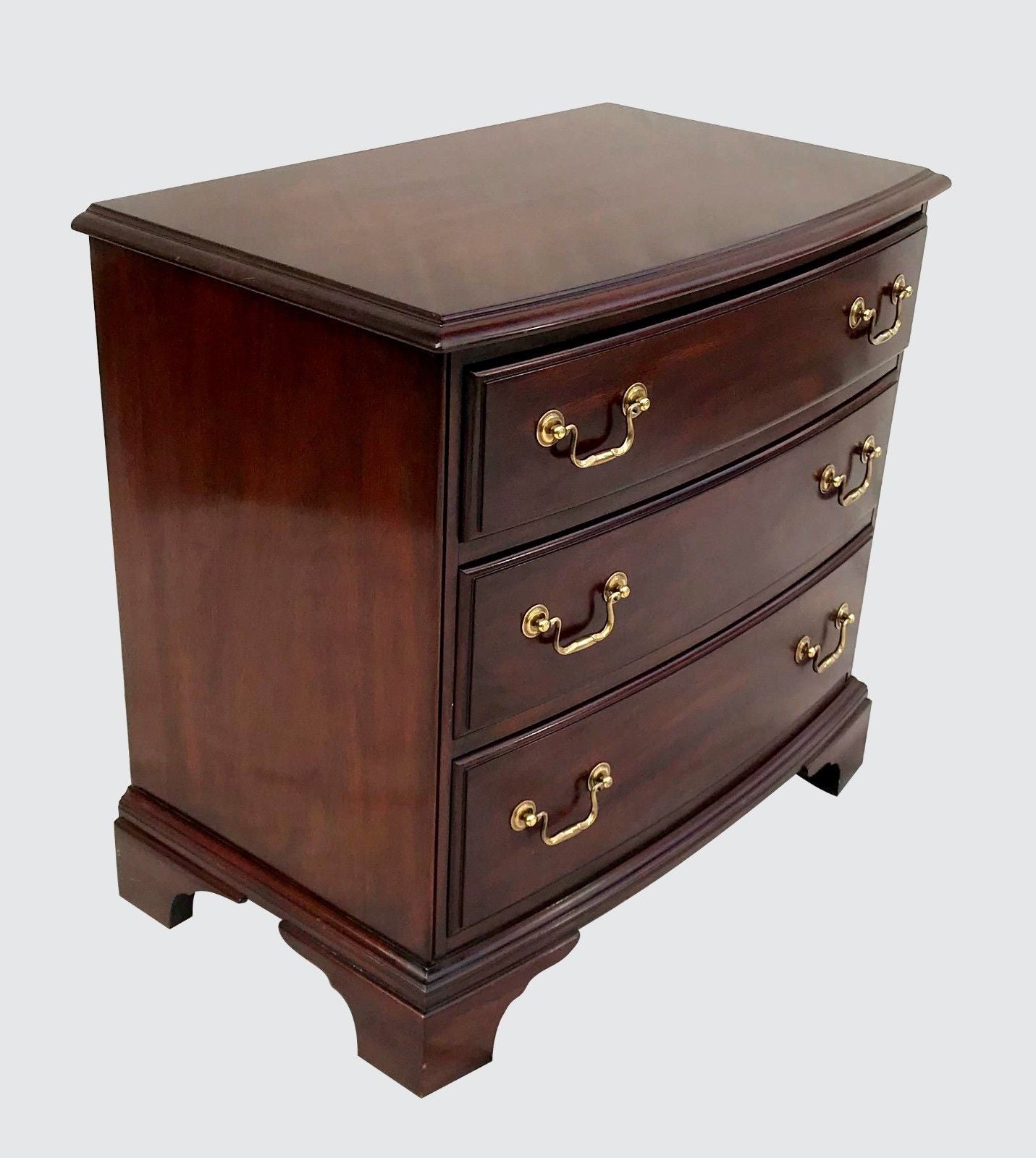 CHIPPENDALE STYLED HENKEL & HARRIS BOW FRONT BACHELORS CHEST WITH WRITING SLIDE