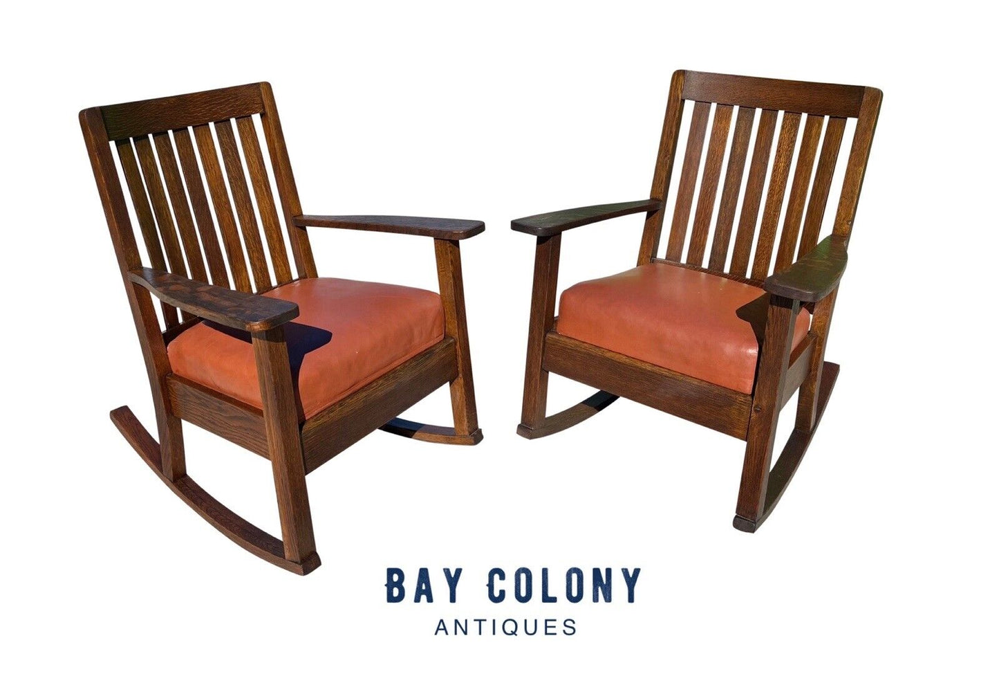 Pair of Antique Arts & Crafts Tiger Oak Rocking Chairs With Orange Leather Seats