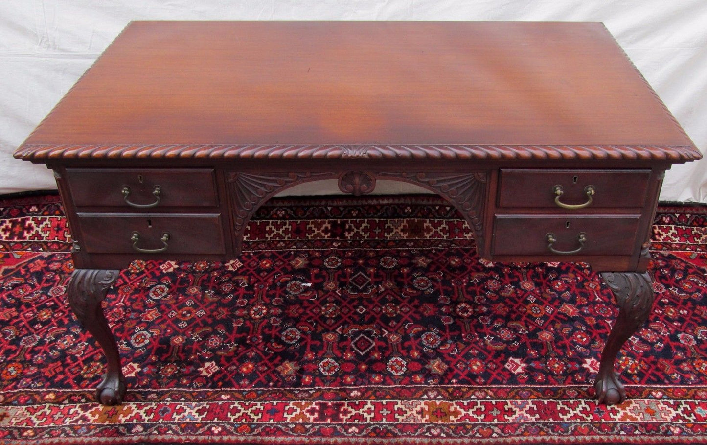 THE FINEST ANTIQUE SOLID MAHOGANY CHIPPENDALE PARTNERS DESK GRADOONED CARVED TOP
