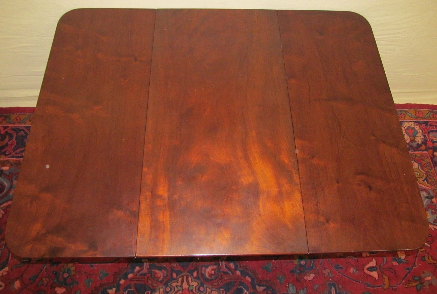 EXCEPTIONAL EMPIRE MAHOGANY BREAKFAST TABLE ON FINELY FORMED OGEE BASE