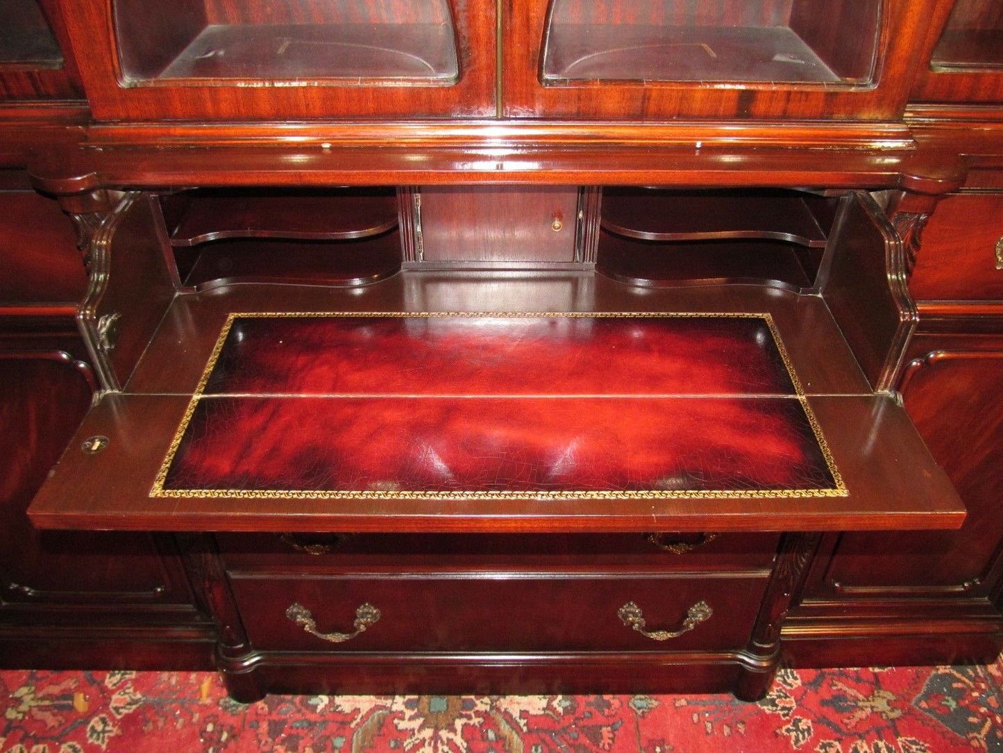 CHIPPENDALE STYLE MAHOGANY BUBBLE GLASS BREAKFRONT WITH BUTLER'S DESK