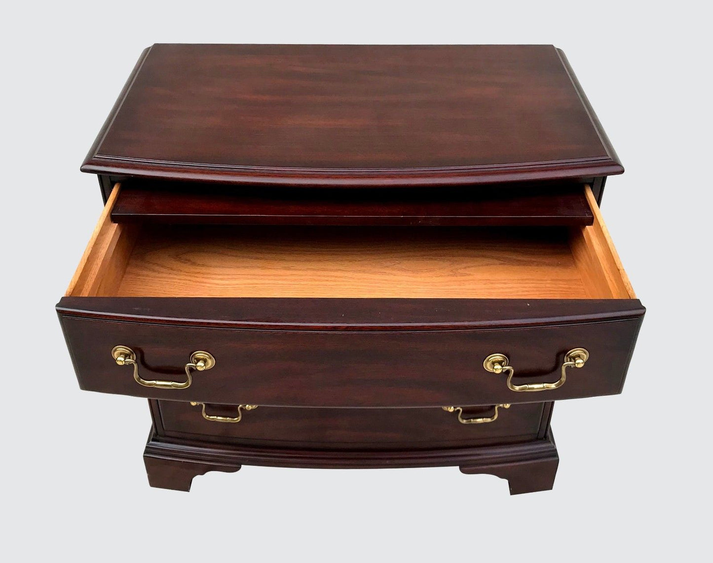 CHIPPENDALE STYLED HENKEL & HARRIS BOW FRONT BACHELORS CHEST WITH WRITING SLIDE
