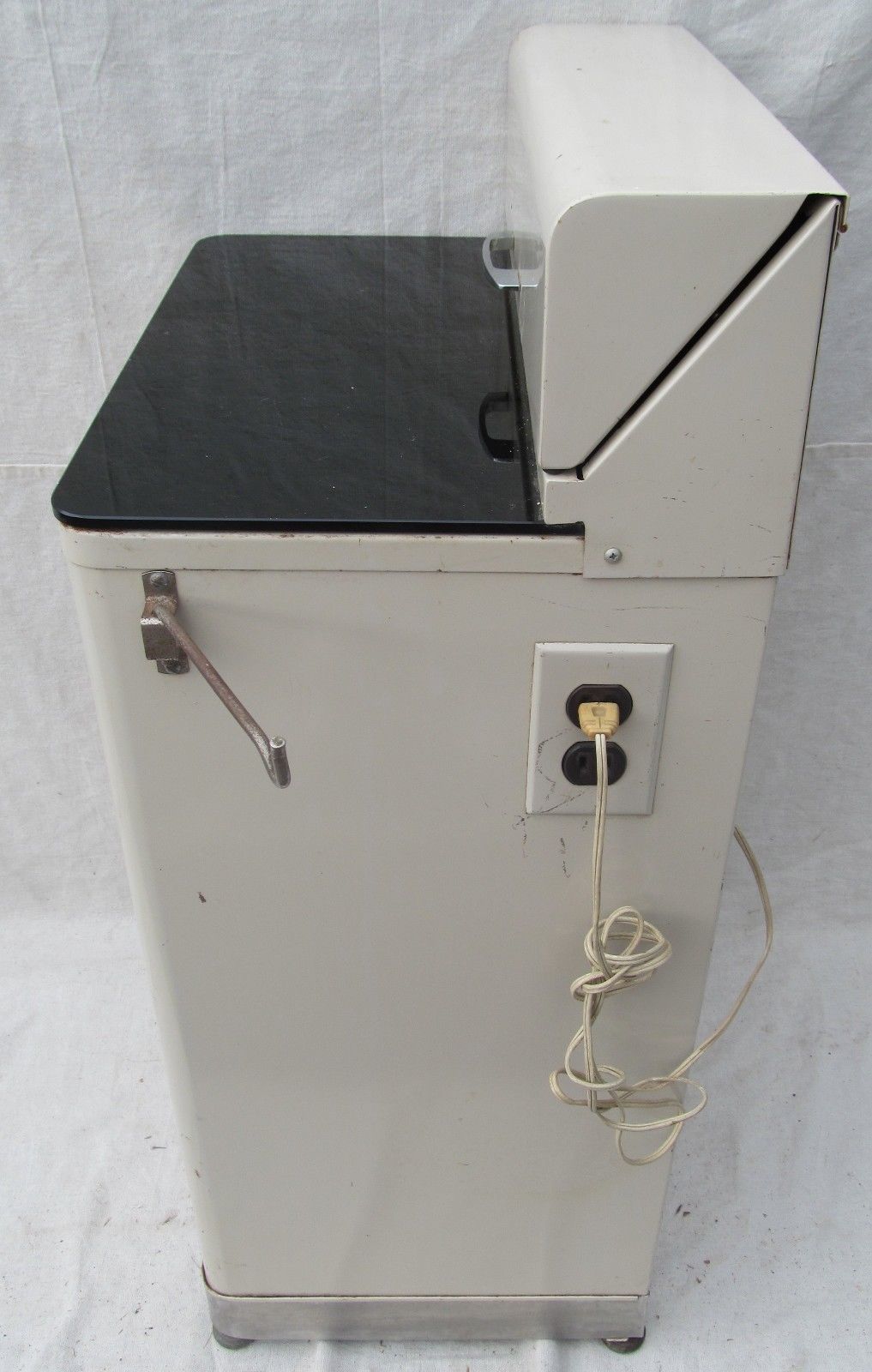 ART DECO ENAMELED MEDICAL CABINET WITH JET BLACK GLASS TOP BY CERTIFIED