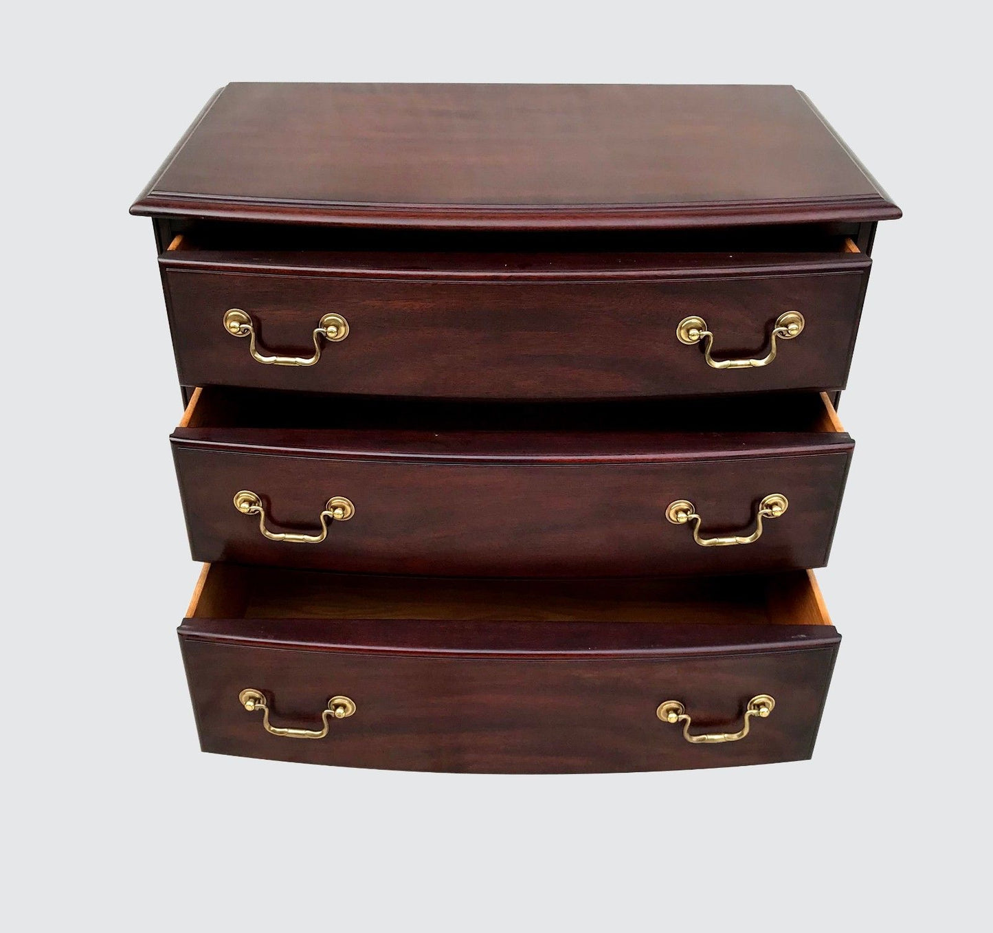 CHIPPENDALE STYLED HENKEL & HARRIS BOW FRONT BACHELORS CHEST WITH WRITING SLIDE