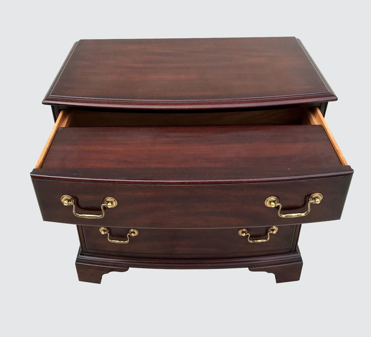 CHIPPENDALE STYLED HENKEL & HARRIS BOW FRONT BACHELORS CHEST WITH WRITING SLIDE