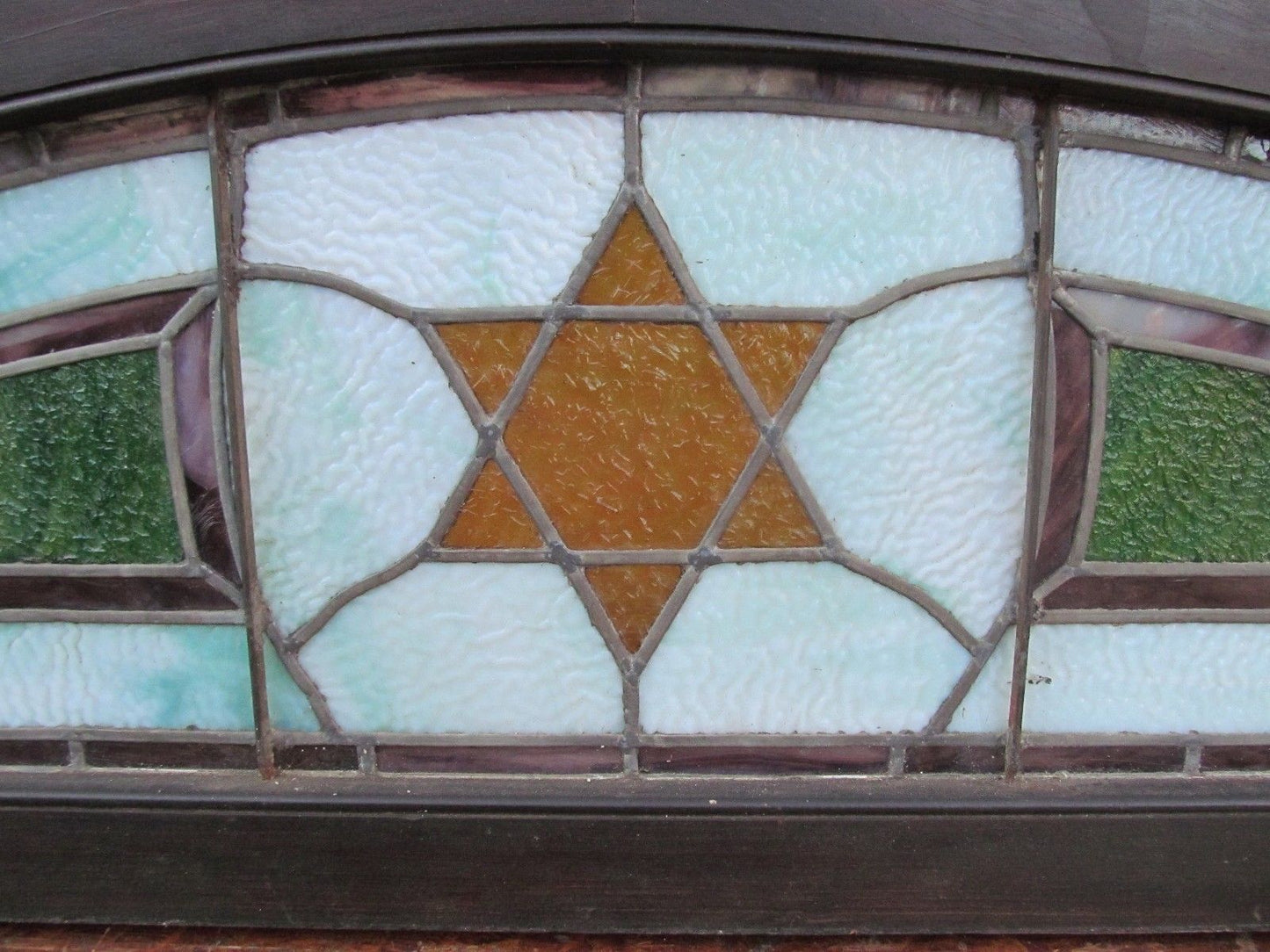 ANTIQUE JUDAIC ARCHITECTURAL STAINED GLASS TRANSOM WINDOW IN FRAME - 80" LONG