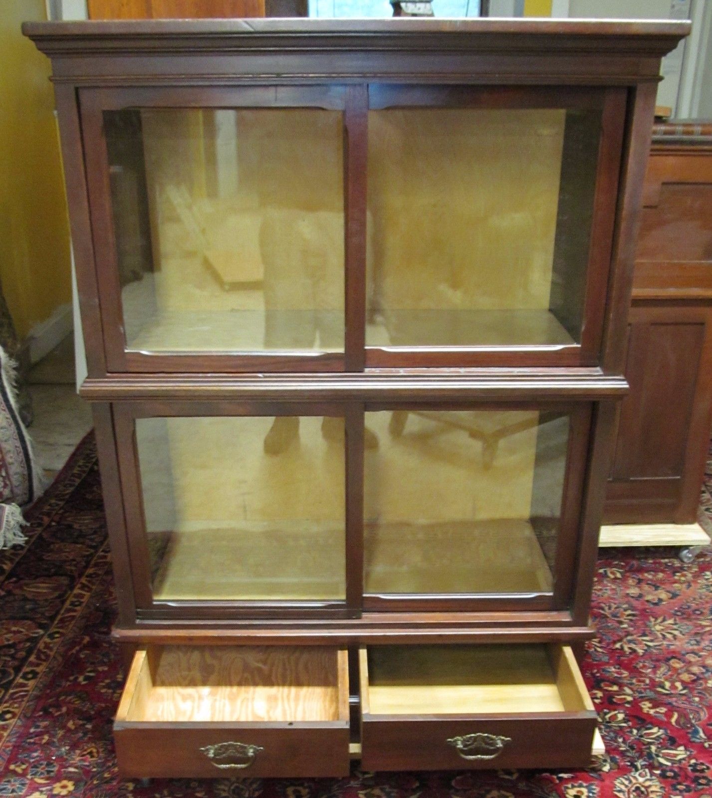 ANTIQUE RAISED PANELED BOOKCASE IN SOLID MAHOGANY-HOLDS ENCYCLOPEDIA SIZED BOOKS