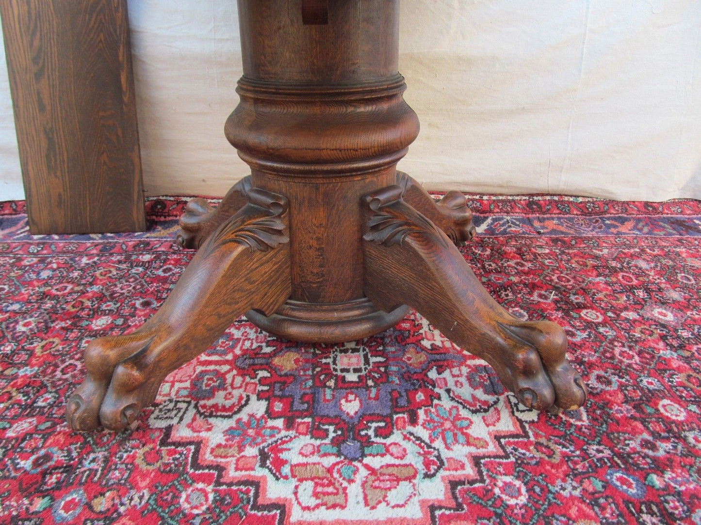 EXTRA CHOICE VICTORIAN TIGER OAK DINING TABLE WITH LION PAW BASE BY LARKIN
