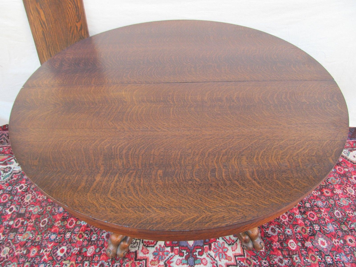 EXTRA CHOICE VICTORIAN TIGER OAK DINING TABLE WITH LION PAW BASE BY LARKIN