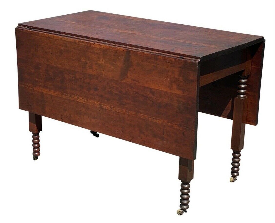 19TH C ANTIQUE SHERATON FIGURED CHERRY DROP LEAF DINING TABLE  W/ SPOOL CARVINGS
