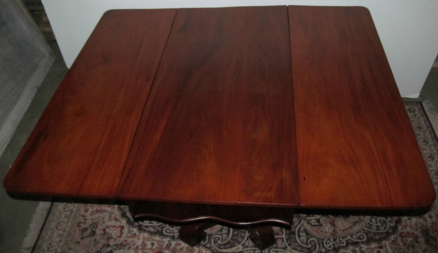 EMPIRE BREAKFAST TABLE WITH SOLID FIGURED MAHOGANY TOP & OGEE ELEPHANT FEET