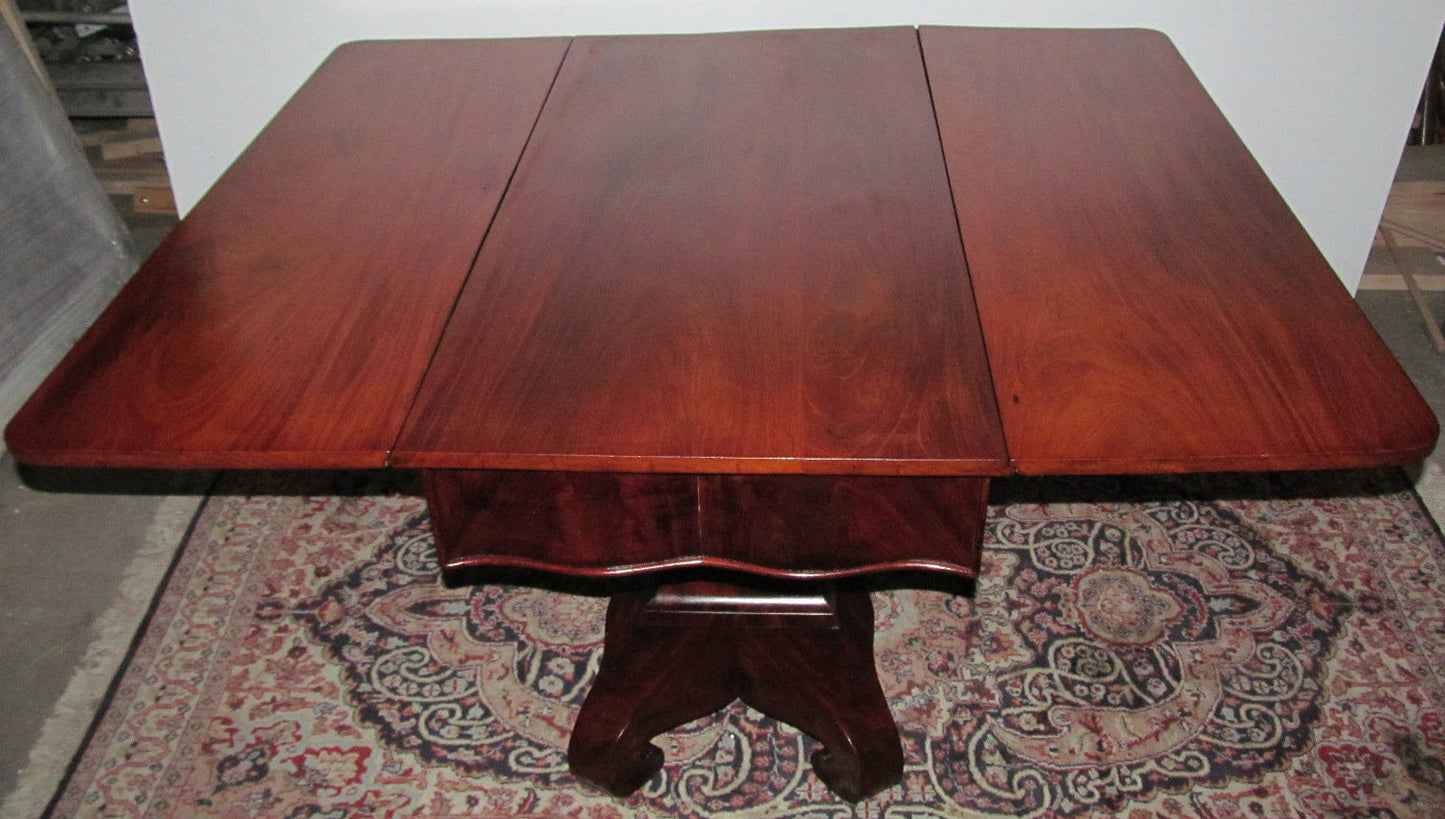 EMPIRE BREAKFAST TABLE WITH SOLID FIGURED MAHOGANY TOP & OGEE ELEPHANT FEET