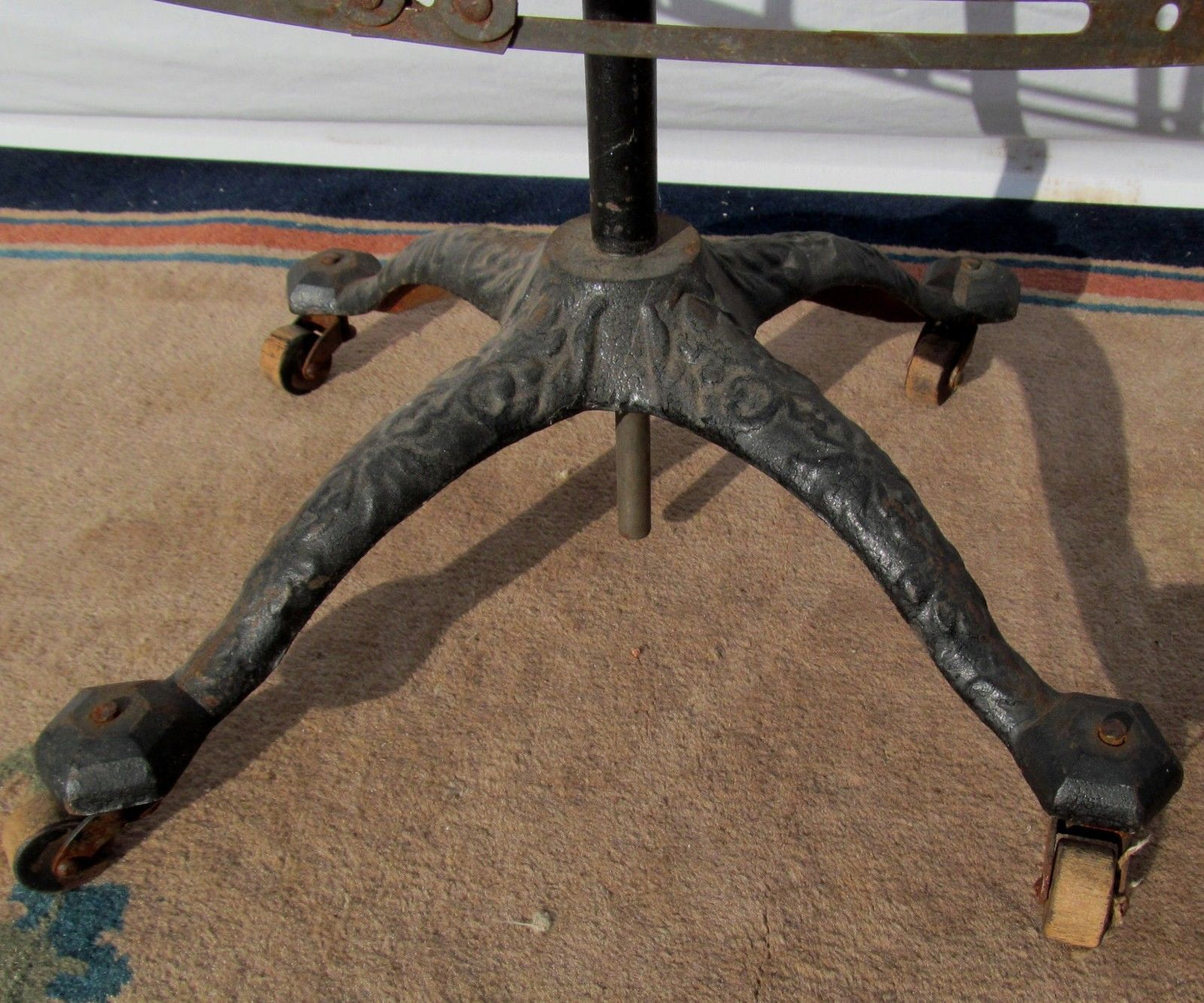 ANTIQUE ACME DRESS FORM ON VICTORIAN CAST IRON BASE