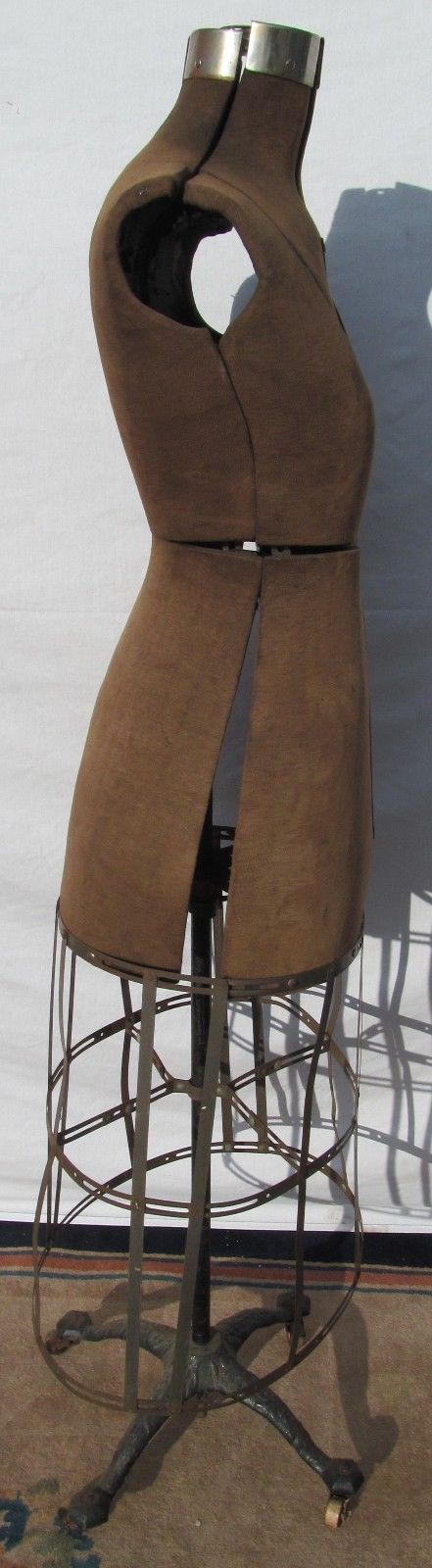 ANTIQUE ACME DRESS FORM ON VICTORIAN CAST IRON BASE