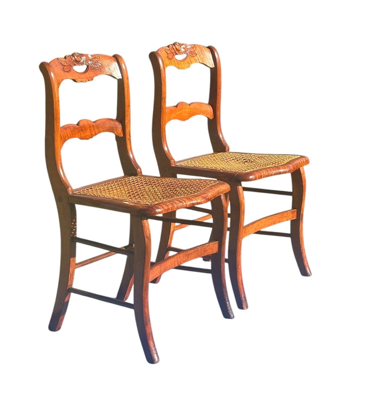 PAIR OF ANTIQUE FEDERAL PERIOD TIGER MAPLE SIDE CHAIRS WITH ROSE CARVED CRESTS