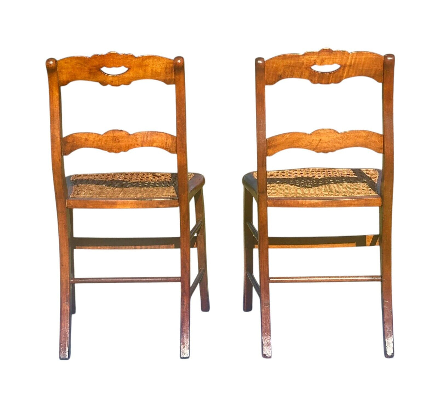 PAIR OF ANTIQUE FEDERAL PERIOD TIGER MAPLE SIDE CHAIRS WITH ROSE CARVED CRESTS