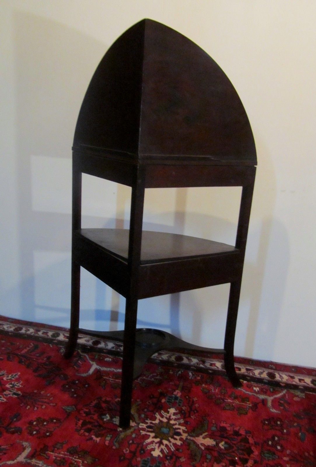 GEORGE III PERIOD MAHOGANY CORNER STAND W/ONE DR & PLANTER STRETCHER BASE