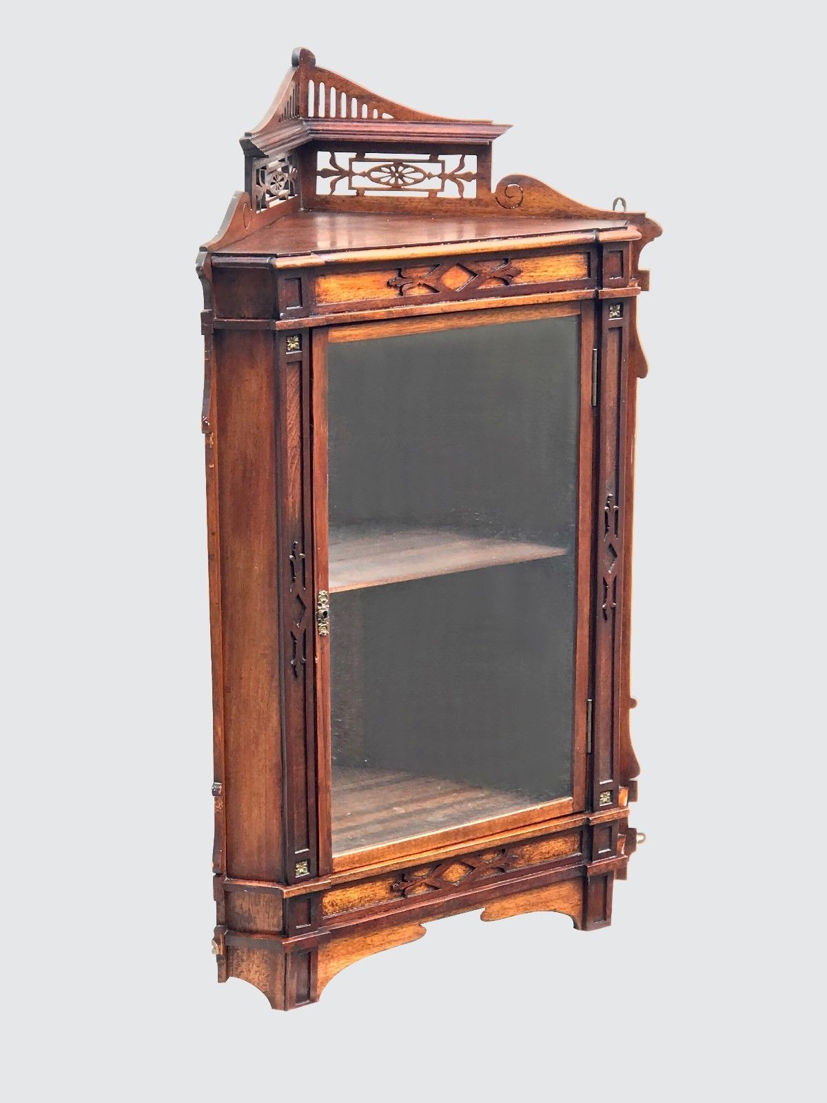 19TH C. VICTORIAN WALNUT HANGING CORNER CABINET W/ FRETWORK GALLERY & GLASS DOOR