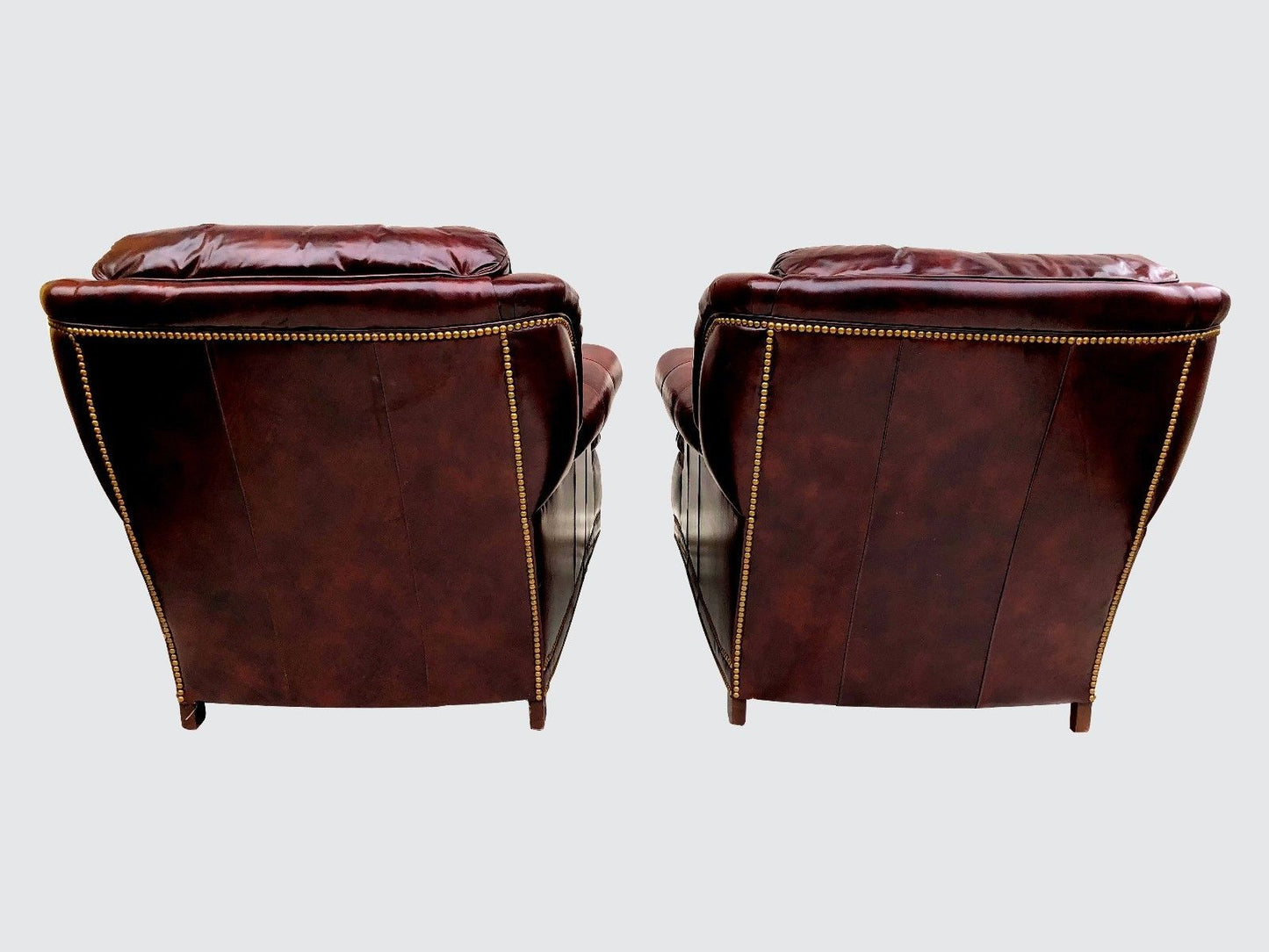 PAIR HANCOCK & MOORE WINE COLORED LEATHER CHESTERFIELD CLUB CHAIRS