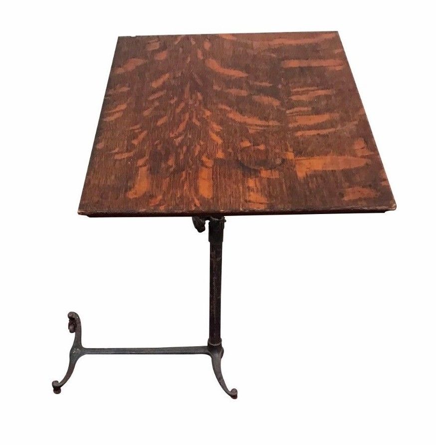 VICTORIAN OAK ADJUSTABLE WRITING TABLE WITH DECORATIVE CAST IRON BASE