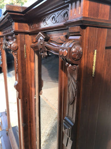 19TH C ANTIQUE CARVED WALNUT VICTORIAN TRIPLE DOOR BOOKCASE BY THOMAS BROOKS