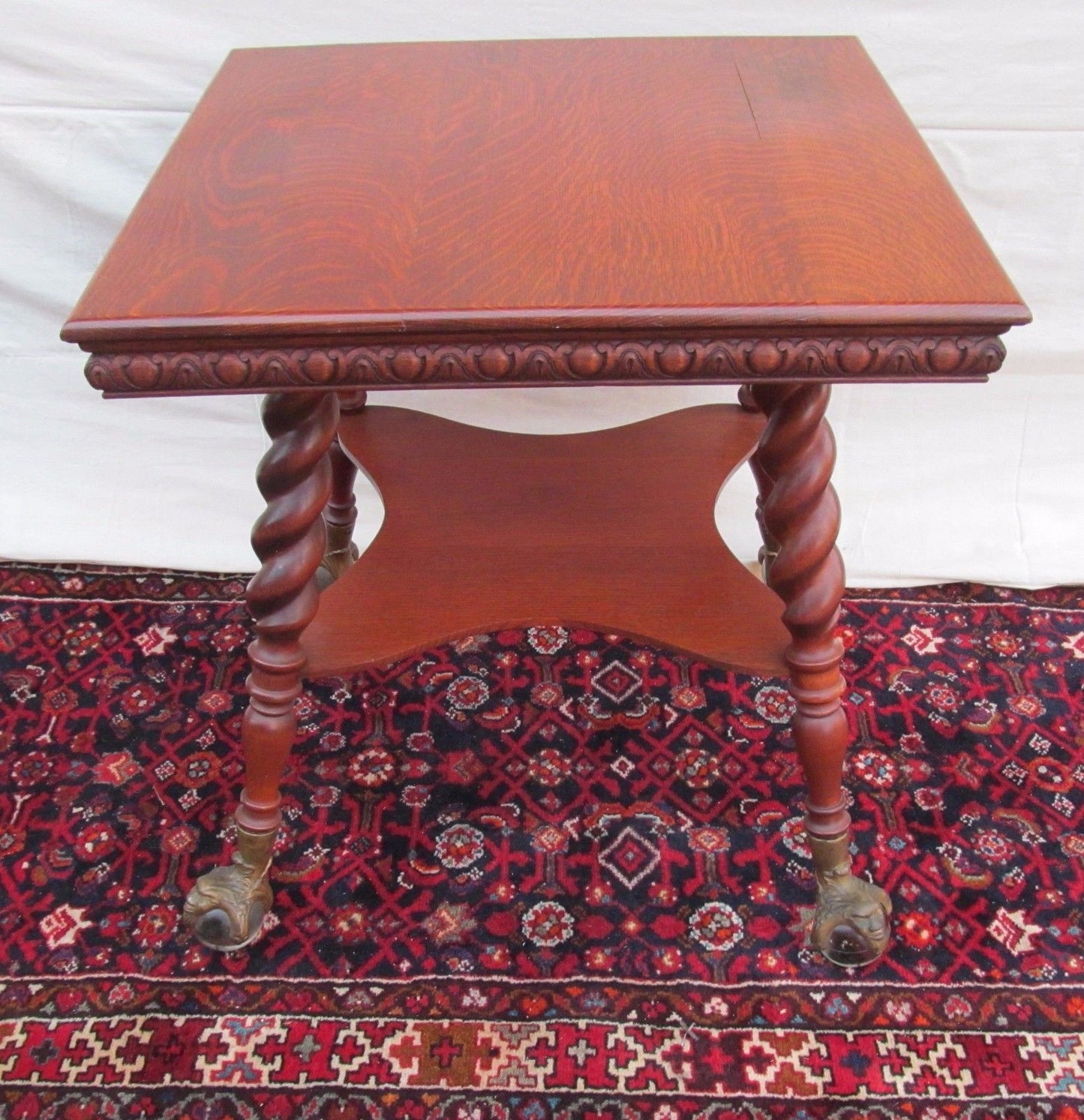 VICTORIAN TIGER OAK PARLOR TABLE WITH GLASS BALL & CAST IRON GROTESQUE HEAD FEET