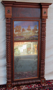 FEDERAL PERIOD REVERSE PAINTED DECORATIVE MIRROR IN CARVED MAHOGANY FRAME
