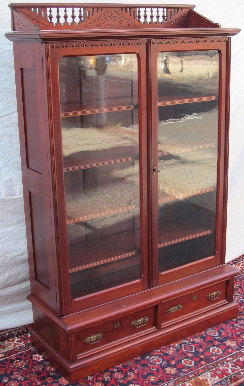 EASTLAKE VICTORIAN CHERRY BOOKCASE WITH NICELY DEFINED STICK & BALL GALLERY