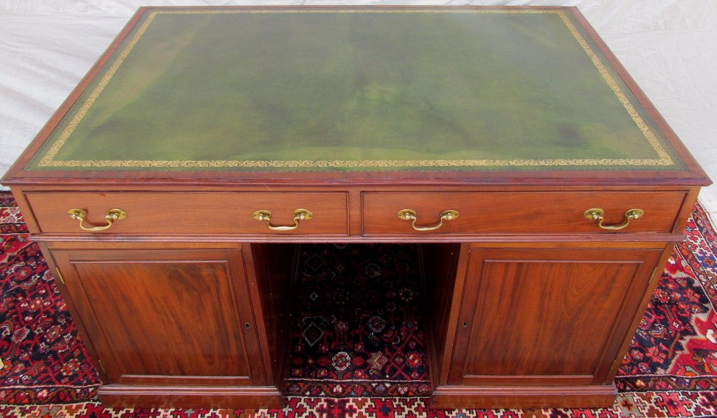 FINE GEORGIAN MAHOGANY CAMPAIGN DESK WITH LEATHER TOP AND PARTNER'S DESK FEATURE