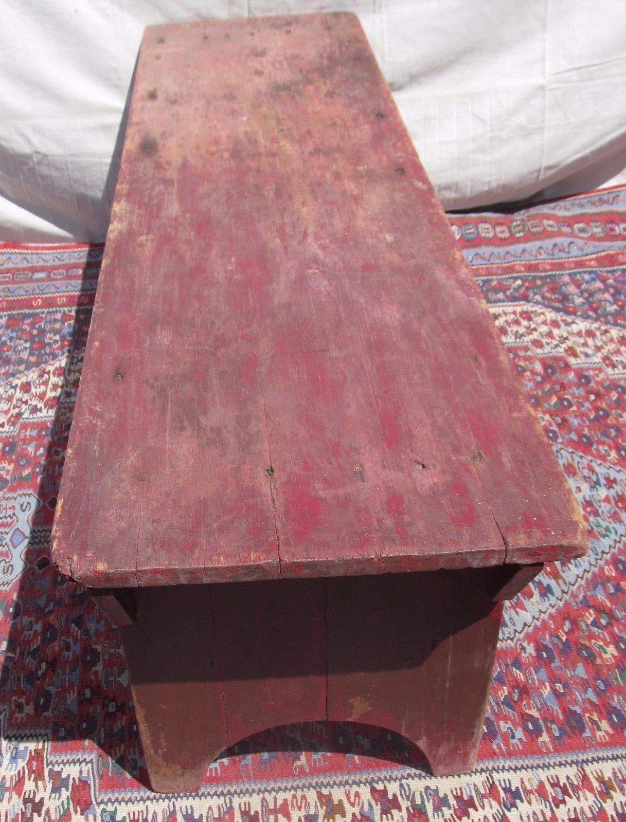 19TH CENTURY NEW ENGLAND PINE BUCKET BENCH IN OLD RED PAINT