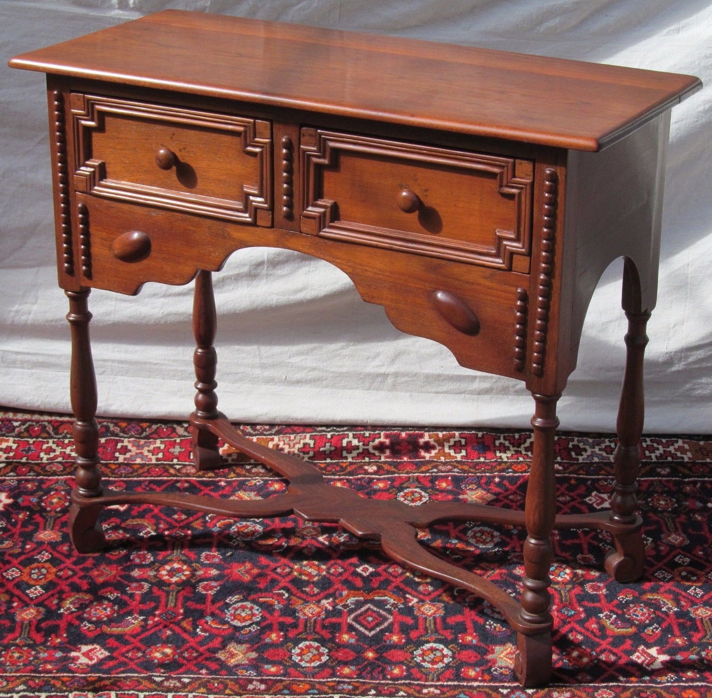 19TH CENTURY WILLIAM & MARY STYLED WALNUT CONSOLE TABLE W/ TURTLE BACK BOSSES