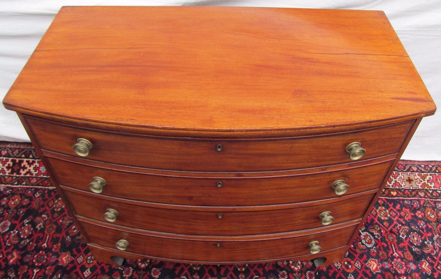 FEDERAL PERIOD BOSTON BOW FRONT MAHOGANY DRESSER ON RARE REVERSE BRACKET BASE