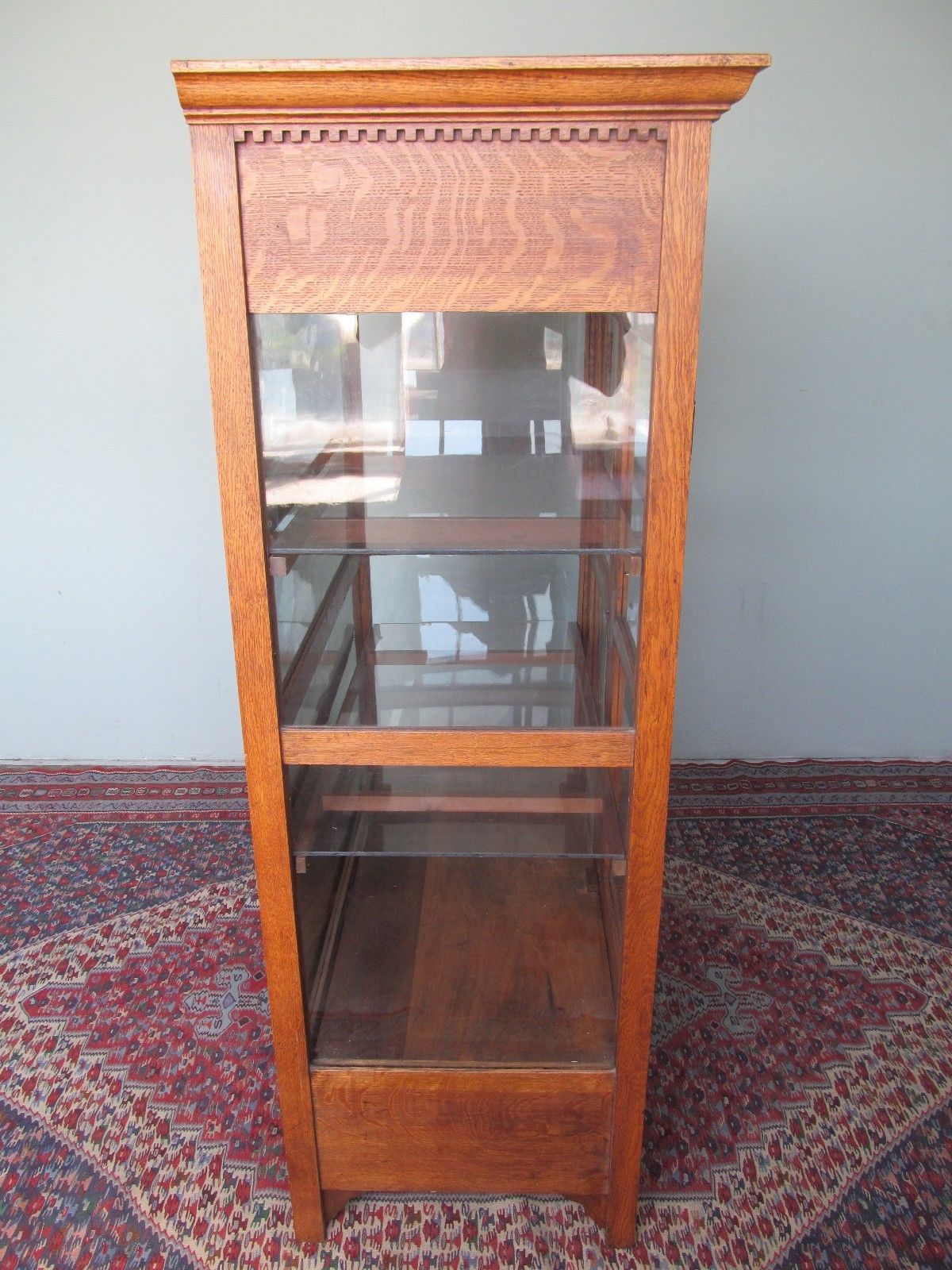 VICTORIAN OAK KITCHEN CABINET WITH CARVED DENTAL WORK MOLDING