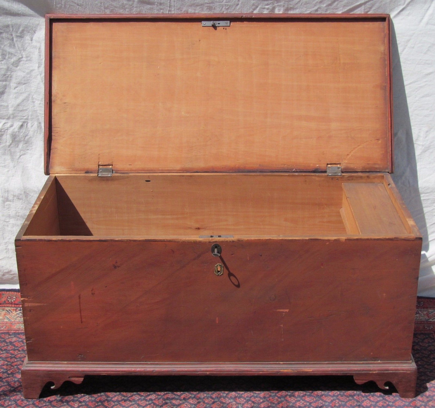 EARLY 19TH CENTURY CHIPPENDALE STYLE PAINTED BLANKET CHEST ON BRACKET FEET