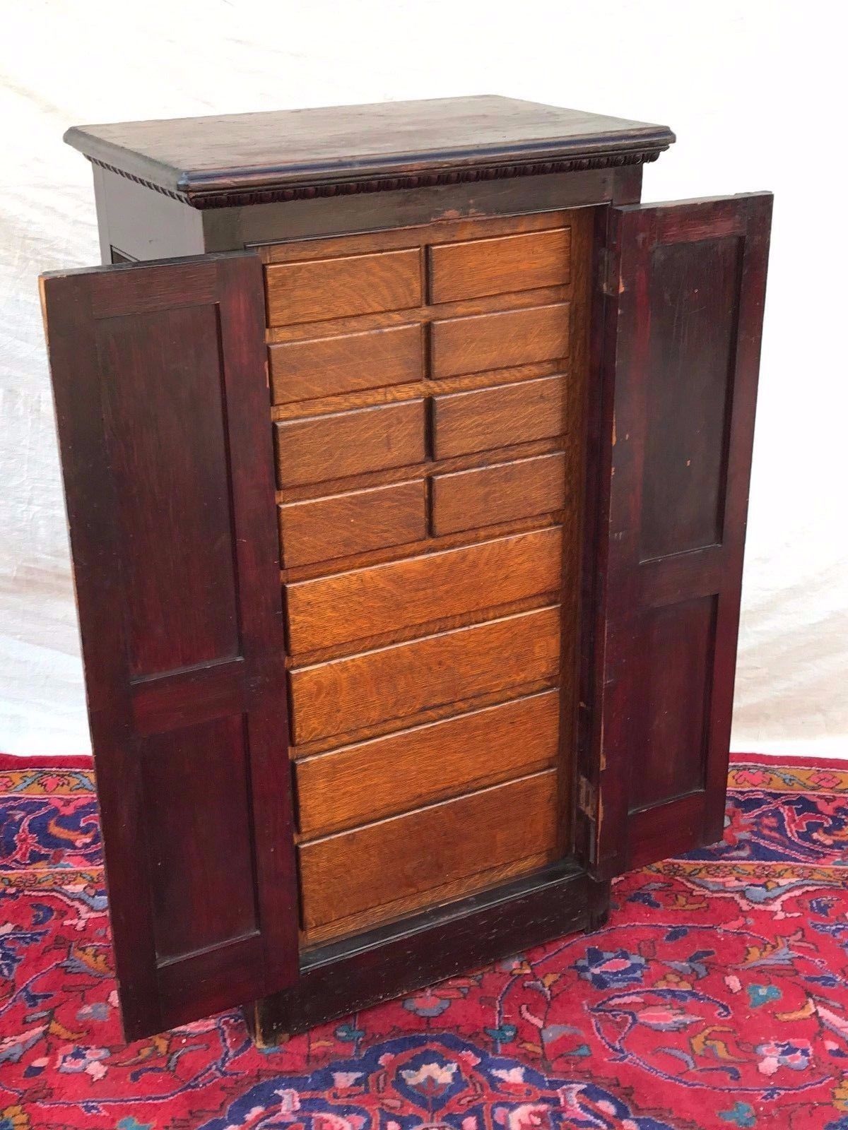 VICTORIAN RAISED PANEL OAK & PINE APOTHECARY CABINET WITH EGG & DART MOLDINGS