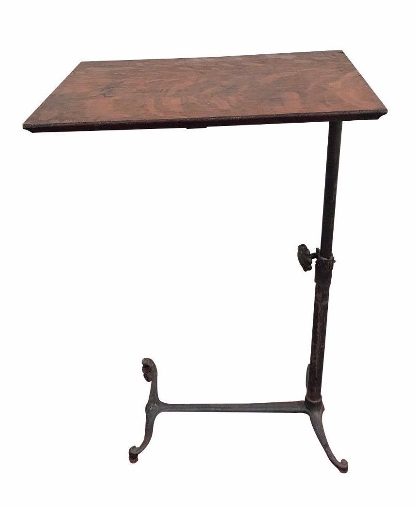 VICTORIAN OAK ADJUSTABLE WRITING TABLE WITH DECORATIVE CAST IRON BASE