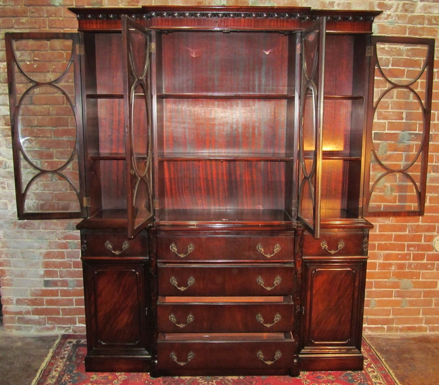 CHIPPENDALE STYLE MAHOGANY BUBBLE GLASS BREAKFRONT WITH BUTLER'S DESK