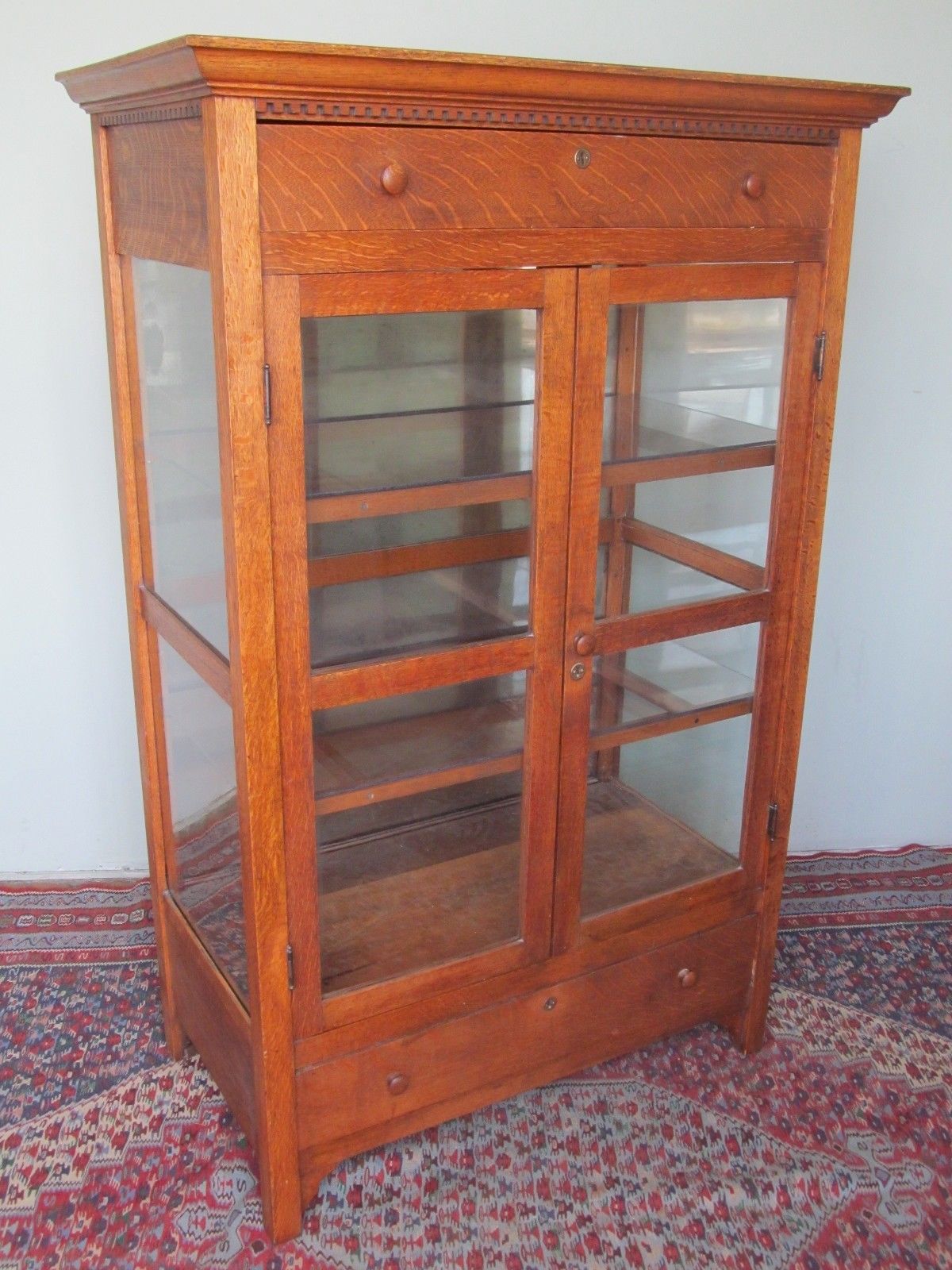 VICTORIAN OAK KITCHEN CABINET WITH CARVED DENTAL WORK MOLDING