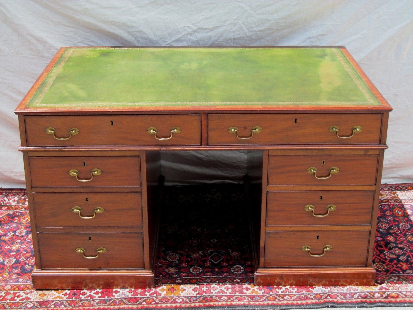 FINE GEORGIAN MAHOGANY CAMPAIGN DESK WITH LEATHER TOP AND PARTNER'S DESK FEATURE