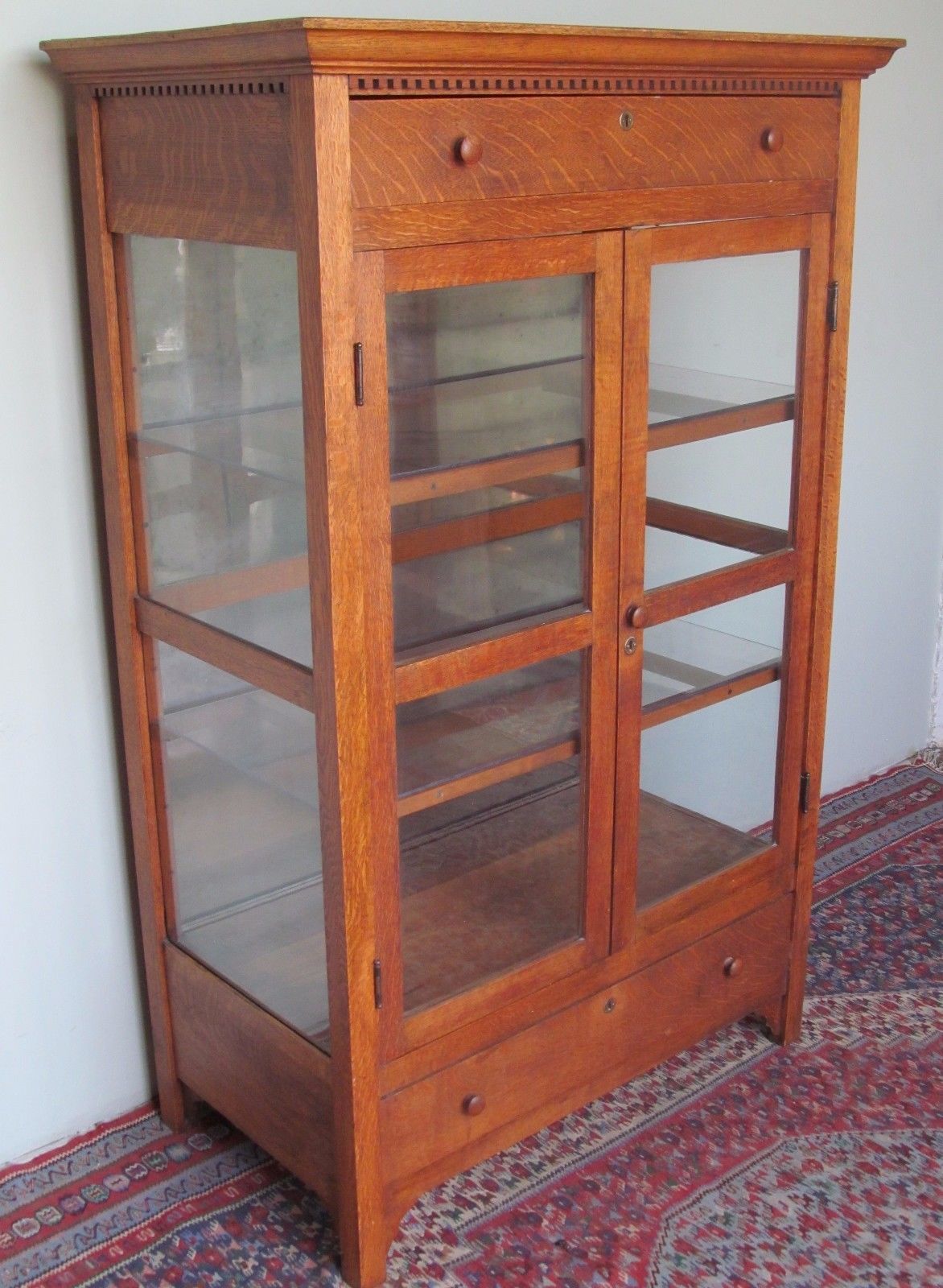 VICTORIAN OAK KITCHEN CABINET WITH CARVED DENTAL WORK MOLDING