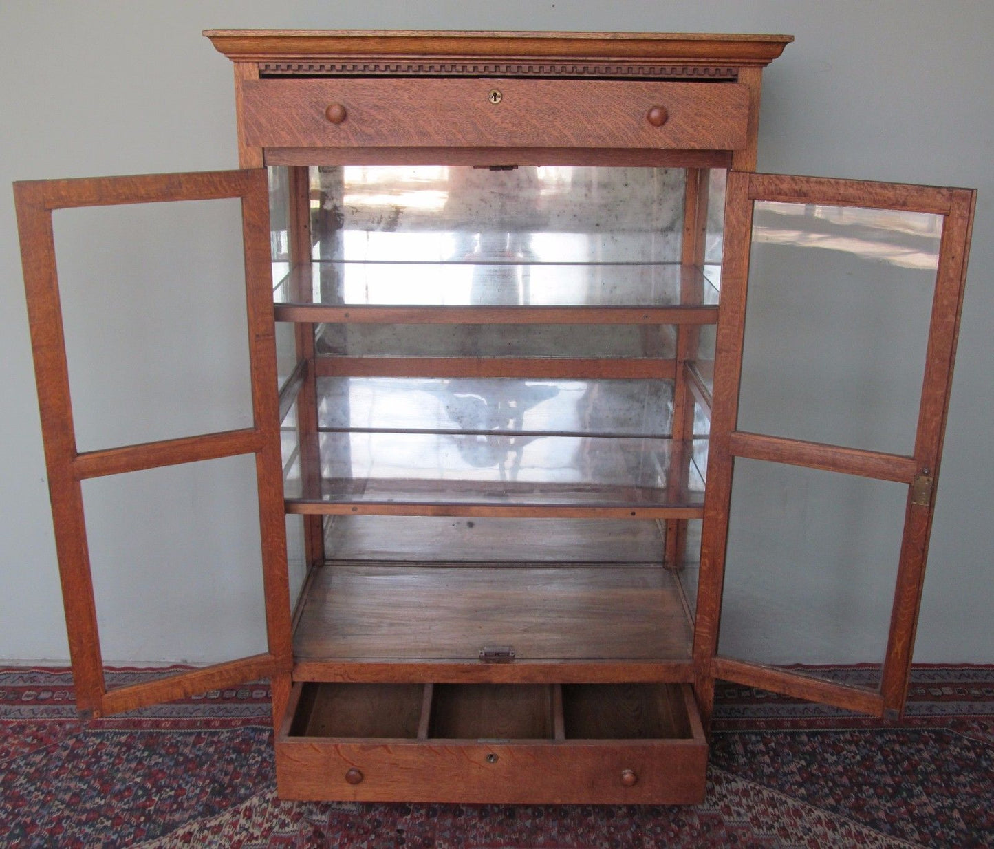 VICTORIAN OAK KITCHEN CABINET WITH CARVED DENTAL WORK MOLDING