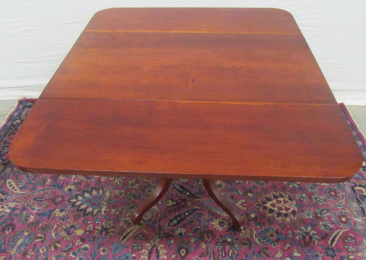 SHERATON NEW ENGLAND CHERRY DROPLEAF BREAKFAST TABLE WITH RARE CARVED BASE